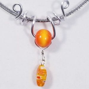 Aluminum Silver Spiral Pendant Orange Wood Bead